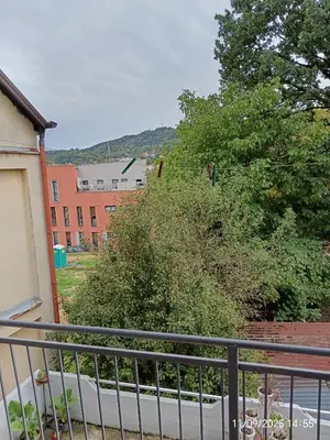 a view of a building from a balcony at CentarTuzla in Tuzla