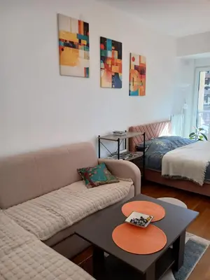 a living room with a couch and a table at iwe in Banja Luka