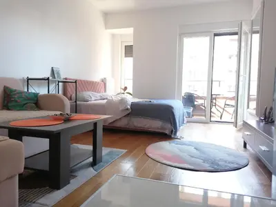 a living room with a couch and a table at iwe in Banja Luka