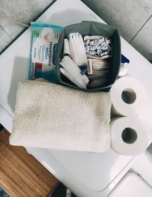a container of toilet paper and some toilet rolls at Sunny Banja Luka in Banja Luka