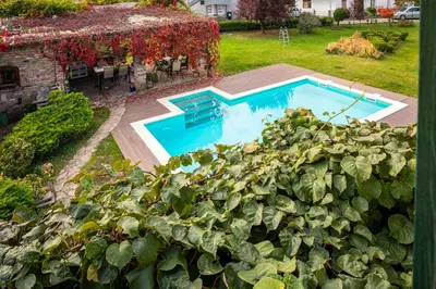 an overhead view of a swimming pool in a yard at Villa Garden in Banja Luka