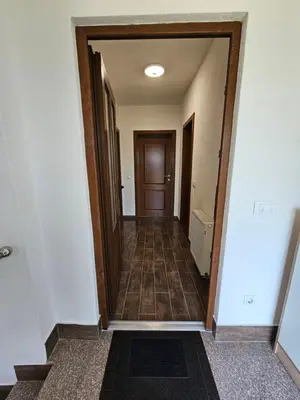 an empty hallway with a hallway leading to a door at Visoko Luxury Residence in Biskupići