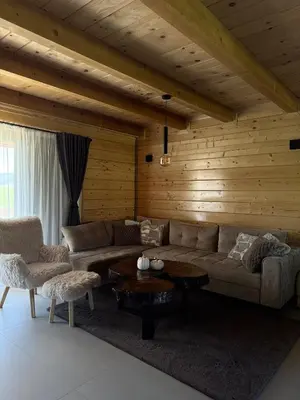 a living room with a couch and a table at Villa Alba in Kupres