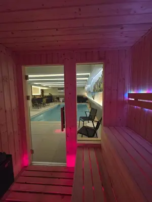 a room with pink lights on the inside of a building at Hotel Cat Deluxe in Sanski most