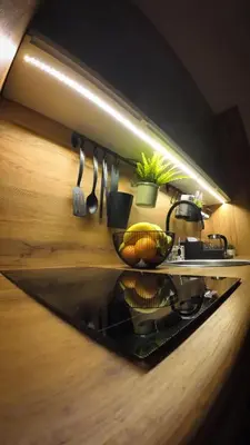 a kitchen with pots and utensils on a counter at Apartman za 5 in Banja Luka