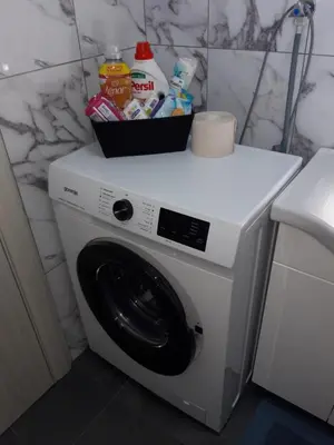 a washing machine with a basket on top of it at Odmor za umorne in Banja Luka