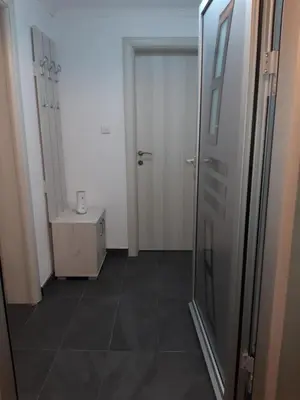 a bathroom with a shower and a toilet and a sink at Odmor za umorne in Banja Luka