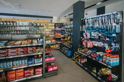 a store filled with lots of food and drinks at Hotel Brcko Gas Doboj in Doboj
