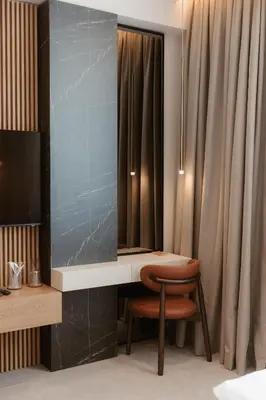 a desk and a chair in a room at Tradicija Hotel in Banja Luka