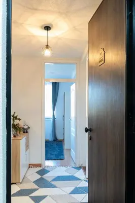 a hallway with a door leading into a room at Apartman Haba Vlašić in Vlasic