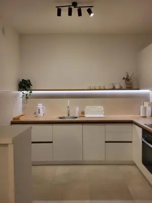 a kitchen with a sink and a counter top at Green view apartment in Banja Luka