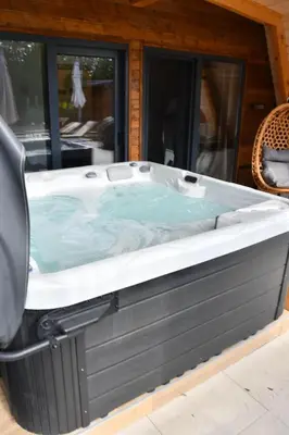 a hot tub sitting in the back of a car at Tasija Relax & Spa in Doboj