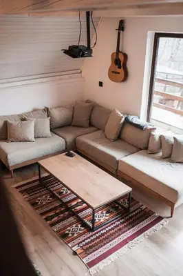 a living room with a couch and a coffee table at Forrest House in Doboj