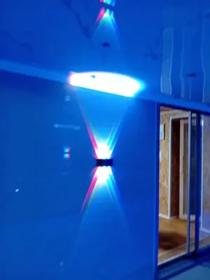 a room with blue lights on the ceiling at Gyps Vikendica with Swimming Pool and Sauna in Tuzla