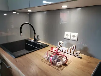 a kitchen counter with a sink and a christmas sign at Kuća za odmor Villa Lana Bihać in Bihać