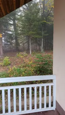 a window of a porch with a white fence at Mountain Home