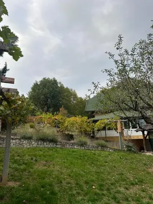 a garden in front of a house at Relax House