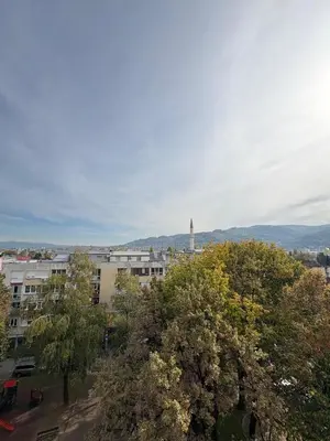 a view of a city with a building and a tower at A&N Apartments in Banja Luka