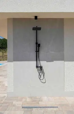 a hose is attached to the side of a building at Dream House Banja Luka in Banja Luka
