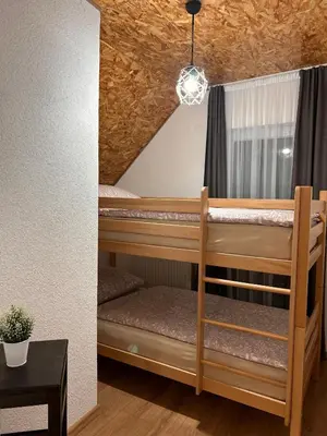 a couple of bunk beds in a room at Vikendica VIA - Čajuša, Kupres in Kupres