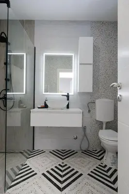 a bathroom with a sink and a toilet at 3D Caffe Apartmani in Visoko