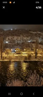 a picture of a city with a river and buildings at Lux apartman sa garažom in Banja Luka