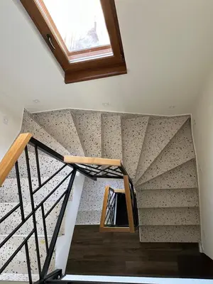 a room with a staircase with a window at Villa Bagrem - Villa with private pool in nature in Banja Luka