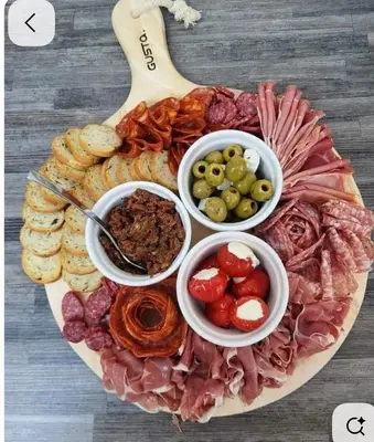 a plate of food with different types of food at Šuma snova in Malešići