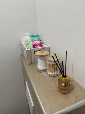 a counter with some brushes and other items on it at Kutak mira in Doboj