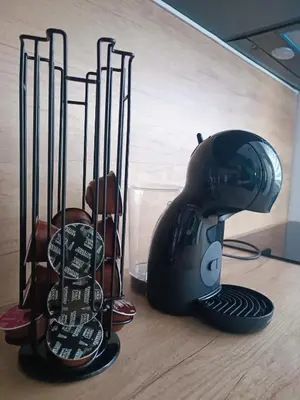 a hair dryer sitting on top of a wooden floor at Apartment in the center with free parking in Banja Luka