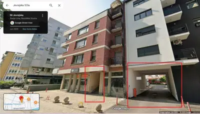 a rendering of a building with a parking garage at Apartment in the center with free parking in Banja Luka