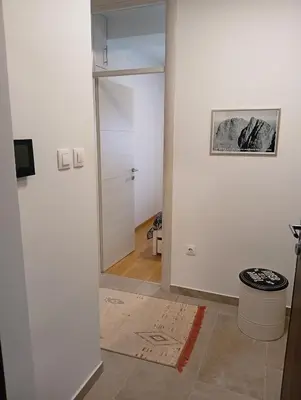 a hallway with a door leading into a room at Beatiful BL in Banja Luka