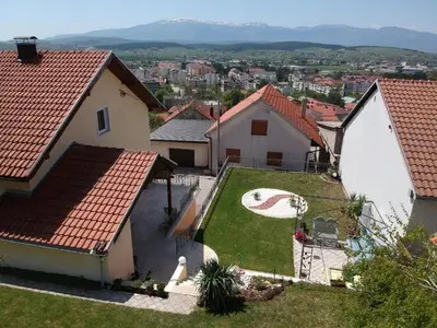 an aerial view of a house with a yard at Apartment M in Livno