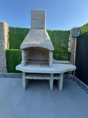 a stone bench sitting on top of a patio at villa M&B in Zbilje