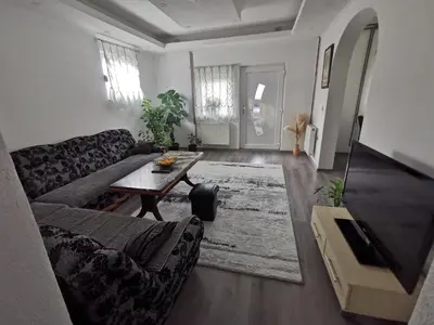 a living room with a couch and a table at smještaj Visoko in Visoko