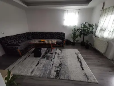 a living room with a couch and a coffee table at smještaj Visoko in Visoko