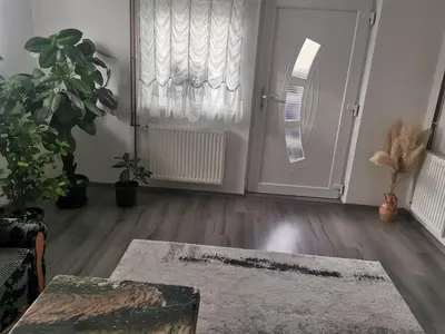 a living room with a couch and a table at smještaj Visoko in Visoko