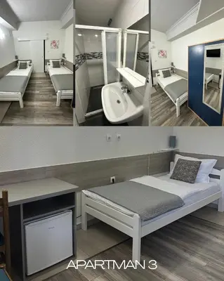 a hospital room with a bed and a sink at Banja Luka Arcadia in Banja Luka