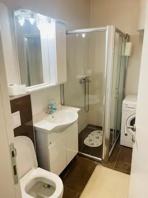a bathroom with a toilet and a sink and a shower at Apartman Klara Banja Luka in Banja Luka