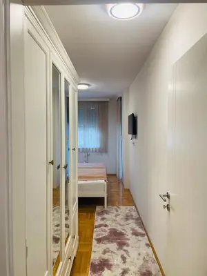 a room with a bedroom with a bed in it at Apartman Klara Banja Luka in Banja Luka