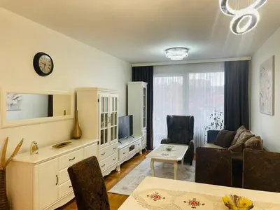 a living room with a couch and a table at Apartman Klara Banja Luka in Banja Luka
