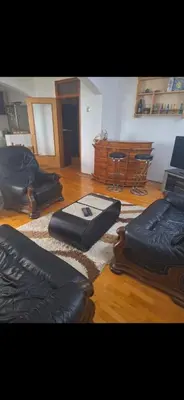 a living room with two bean bags on the floor at Stan Banja Luka Nova Godina in Krndija