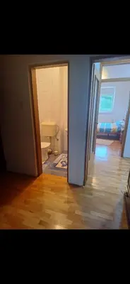 an open room with a bathroom with a toilet in it at Stan Banja Luka Nova Godina in Krndija