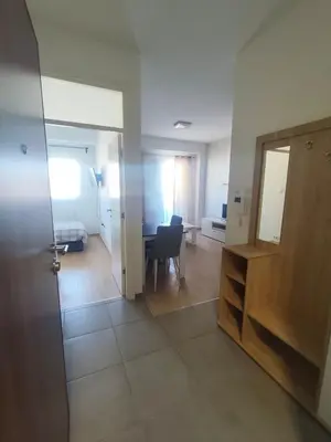 a room with a door and a mirror and a desk at Gray Heaven Retreat in Banja Luka