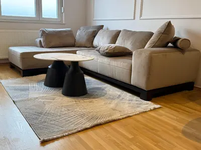 a living room with a couch and a table at Apartman sa dvije sobe in Banja Luka