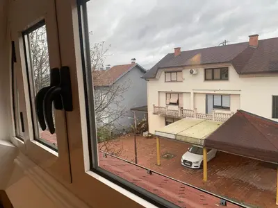a view from a window of a house with a balcony at Vista Dubica in Bosanska Dubica