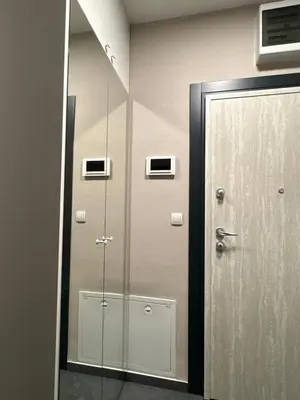 a mirror in a bathroom with a door and a mirror at Apartment Lofty Dreams in Banja Luka