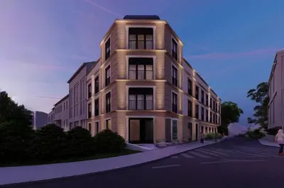 a rendering of a building on a city street at VIP Apartman Friendly Home in Tuzla