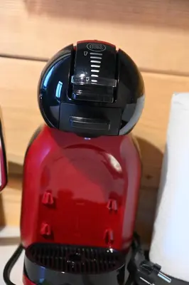 a red blender sitting on top of a counter at Kozara Panoramic Resort in Bosanska Gradiška