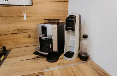 a coffee maker sitting on top of a counter at Villa Žigić